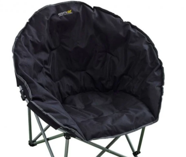 Regatta Castillo Camping Chair
Next, we have the trusty Castillo Camping Chair, for campers who prefer something a little different. 
This model is a lightweight design and comfortably padded throughout. The Castillo Camping Chair features a steel frame that’ll give you outstanding support. 
Perfect for when you just want to kick back, relax and be comfortable. The handy wrap-around design will also offer some protection against any unpleasant drafts of wind.
Key information: 

Fully foldable. 
Steel frame design.
Durable.
Reliable.
Sturdy.
Lightweight design. 
Additional padding throughout. 
Dimensions: 83 x 82 x 65cm

Find out more about the Regatta Castillo Camping Chair.
