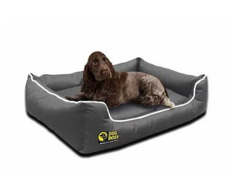 Dog Doza Waterproof Memory Foam Settee Dog Bed
If you have a dog that needs a little help settling into a new place, the Dog Doza Waterproof Memory Foam Settee Dog Bed could be a perfect choice. 
This dog bed is not only stylish but also very useful, especially for an outdoor holiday. It’s water-resistant, and it’ll ensure that the creepy crawlies found in nature stay away from your pooch – thanks to its flea and mite resistance. 
What’s more, you can rest assured knowing that your dog will have an ultra-comfortable spot to recoup after a long day outdoors, as it is constructed from a quality Orthopedic Memory Foam.  
