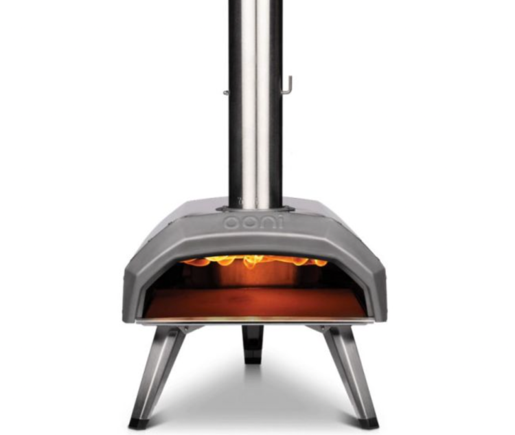 Ooni Karu 12 Multi-Fuel Pizza Oven
Next, we have the impressive Ooni Karu 12 Multi-Fuel Pizza Oven. 
This is a multi-fuel pizza oven, which means you’ll have the option to use either real wood, charcoal or gas for cooking, depending on the taste you want to achieve. Perfect for foodies who love to switch it up. 
What’s more, the Ooni Karu 12 Multi-Fuel Pizza Oven is super easy to set up – all you’ll have to do is unfold the legs, attach the chimney and choose your fuel type to start cooking the best meals out in the great outdoors. 
