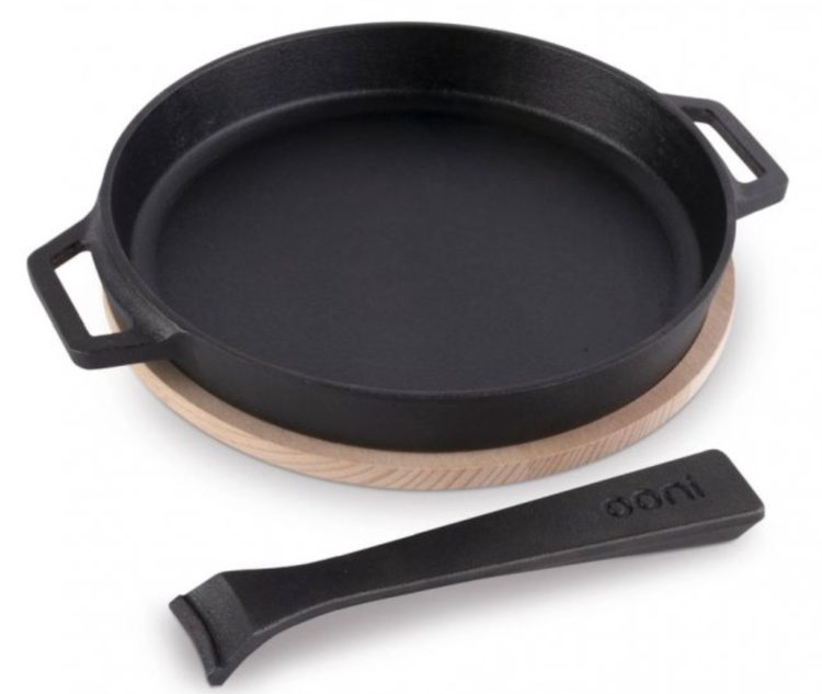 Ooni Cast Iron Skillet Pan
Introducing the Ooni Cast Iron Skillet Pan – the cooking tool you need to create the most delicious meals alfresco style. 
Whether you’re whipping up seafood, a meaty treat or even a veggie-based dish – this skillet pan will help you to make anything you want with ease. The skillet pan retains heat exceptionally well and features a removable handle, allowing you to move the dish from the oven to the table straight away. 
