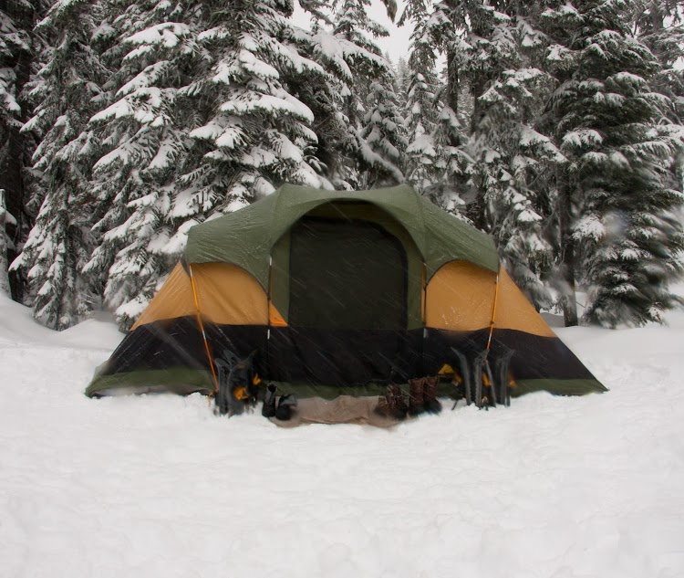 Winter camping
Winter camping is a wonderful way to get away from the hustle and bustle of your daily routine, and take some time for yourself. You could even combine some of the outdoor winter activities on this list into your trip for the total cold weather experience.
This is one of the best winter activities for the whole family, as you can bundle together in your tent and spend the weekend surrounded by nature. Camping in winter is often a quieter time of year, so pitches can be cheaper – which is perfect if you’re on a budget.
